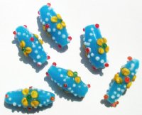 6 23mm Milky Aqua with Yellow Flower Bumpy Oval Beads